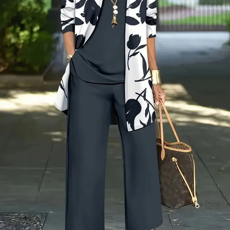 Women's printed three-piece casual suit set in polyester, showing jacket, vest, and trousers.