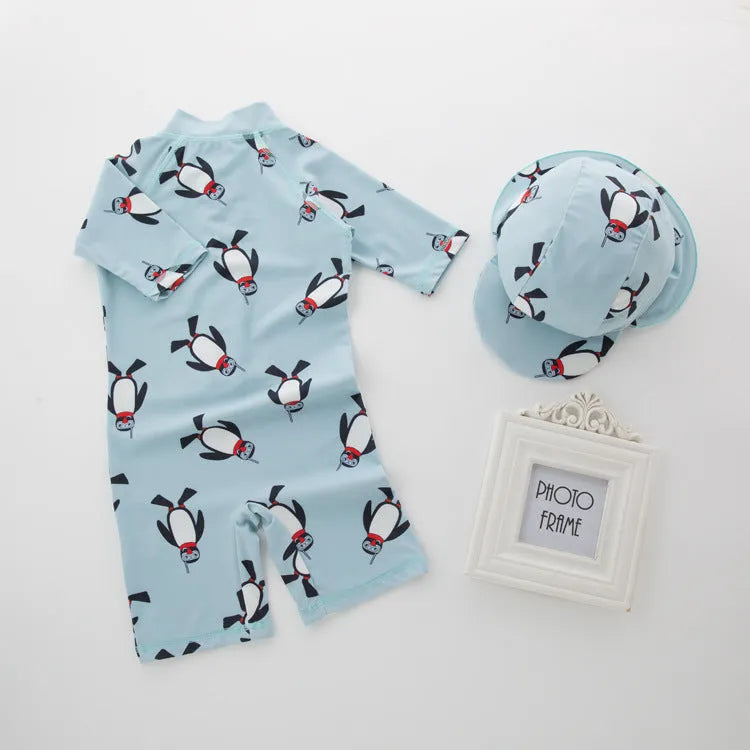 Boys penguin design swimwear set with long sleeves and matching swimming cap