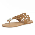 Women's black flip-toe sandals with rhinestone detailing and hollow design on flat rubber sole