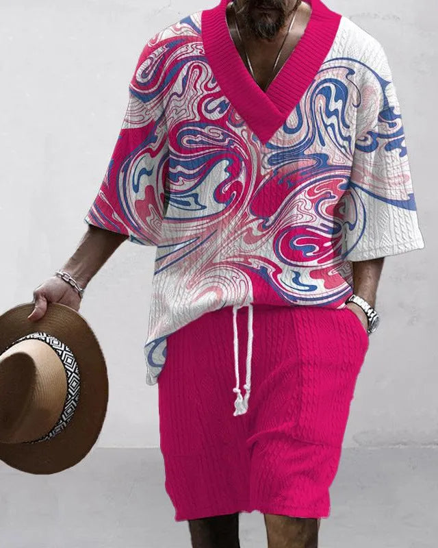 Man wearing a loose fit casual short sleeve top and matching shorts suit set