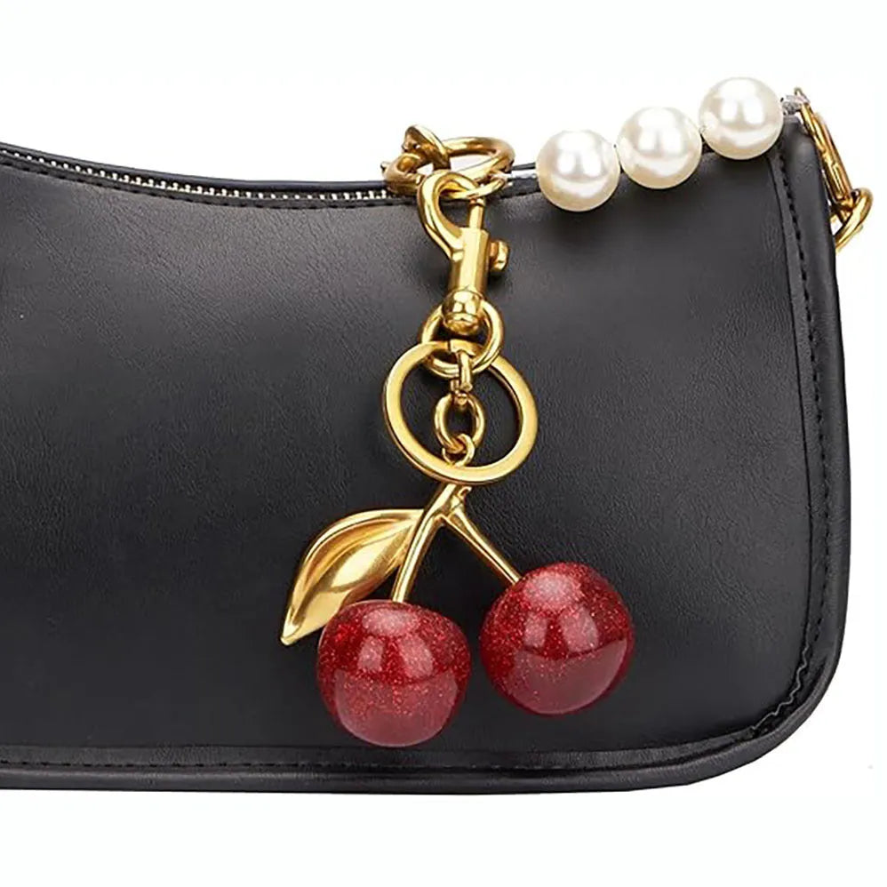 Zinc alloy cherry charm key ring with three-dimensional design in red or pink colour