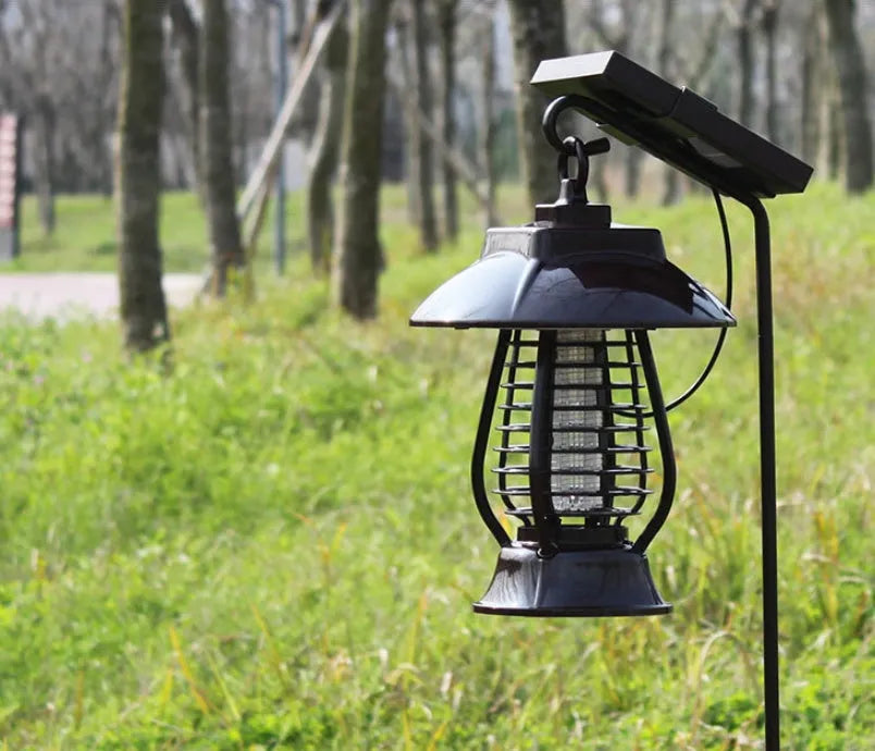 Black solar mosquito lamp with solar panel and LED lights for outdoor insect control
