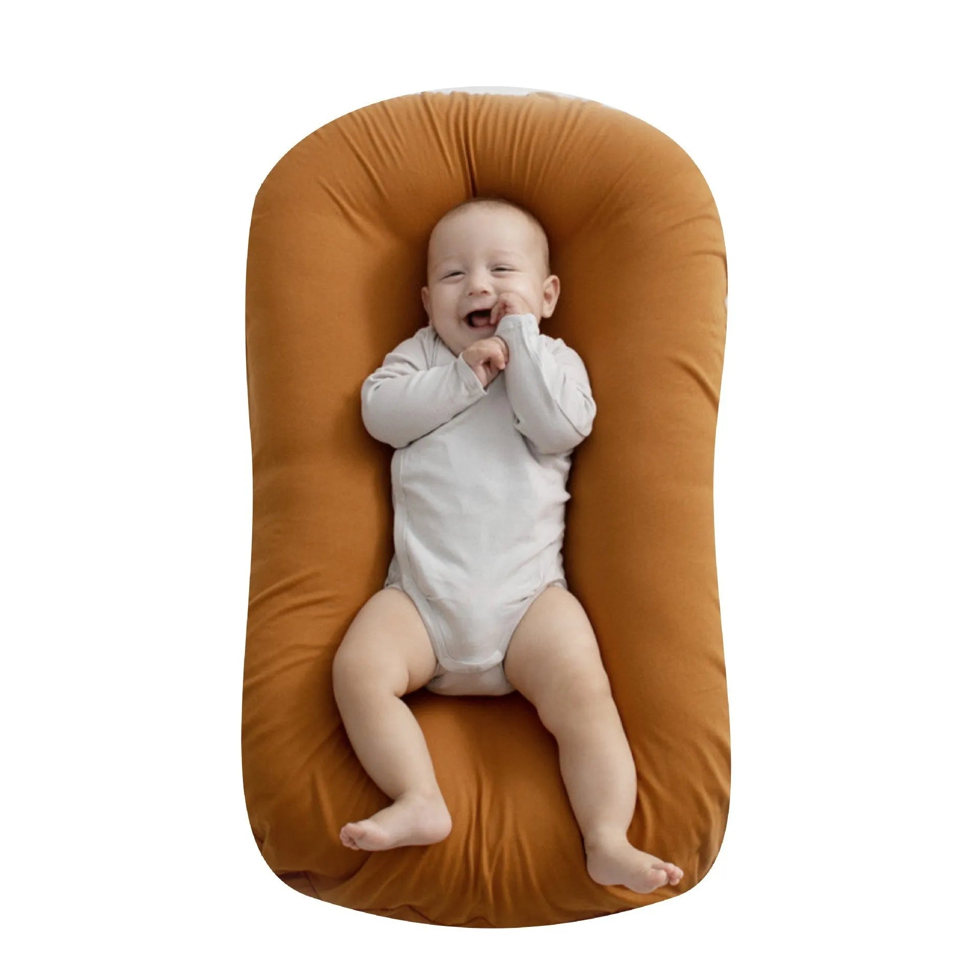 Beige portable cotton baby nest crib cushion measuring 75cm by 45cm for infant sleep.