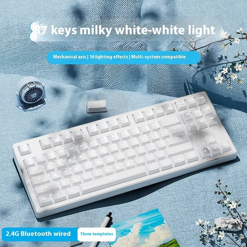 Wireless mechanical keyboard with three connection modes, shown in a choice of 87-key or 108-key layouts and various colour themes.