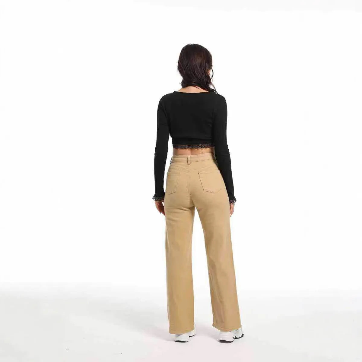 Women's straight leg jeans with wide leg silhouette in apricot colour showing high waist design