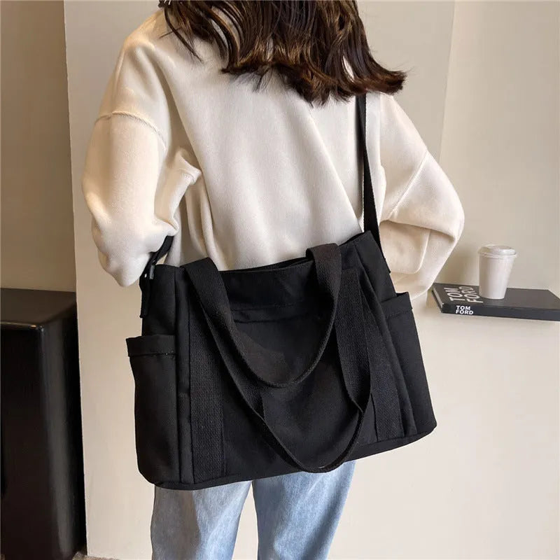 Large capacity shoulder canvas tote bag in solid colour with sandwich pocket and mobile phone compartment