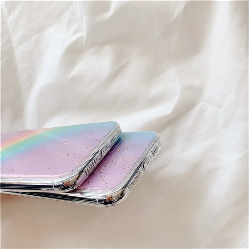 Rainbow gradient iPhone case with striped design on a phone