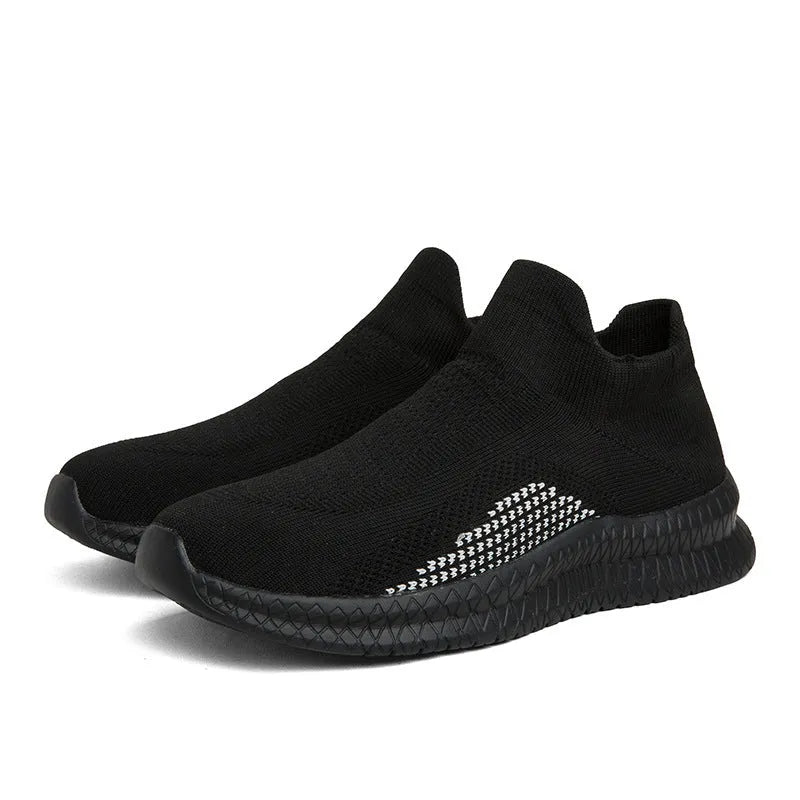 Men's white Popcorn Flyknit low-top casual sneakers with round toe on a neutral background.