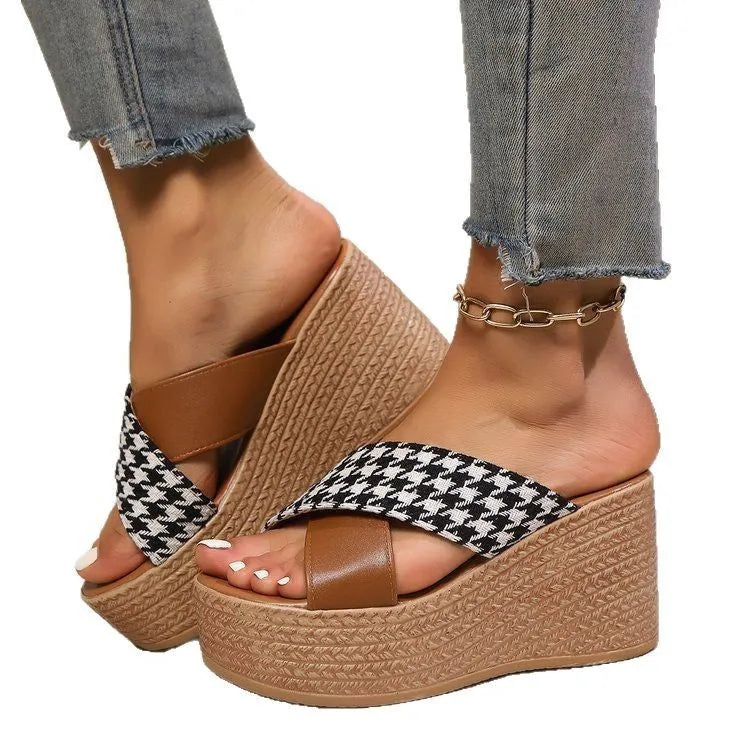 Cross leopard plaid pattern wedge sandals with a brown and black design and a rubber sole.