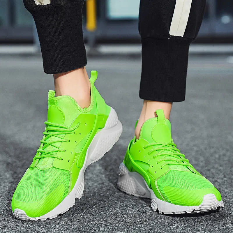 Men's casual low top shoes with mesh upper, cross straps, and flat heel in multiple colours