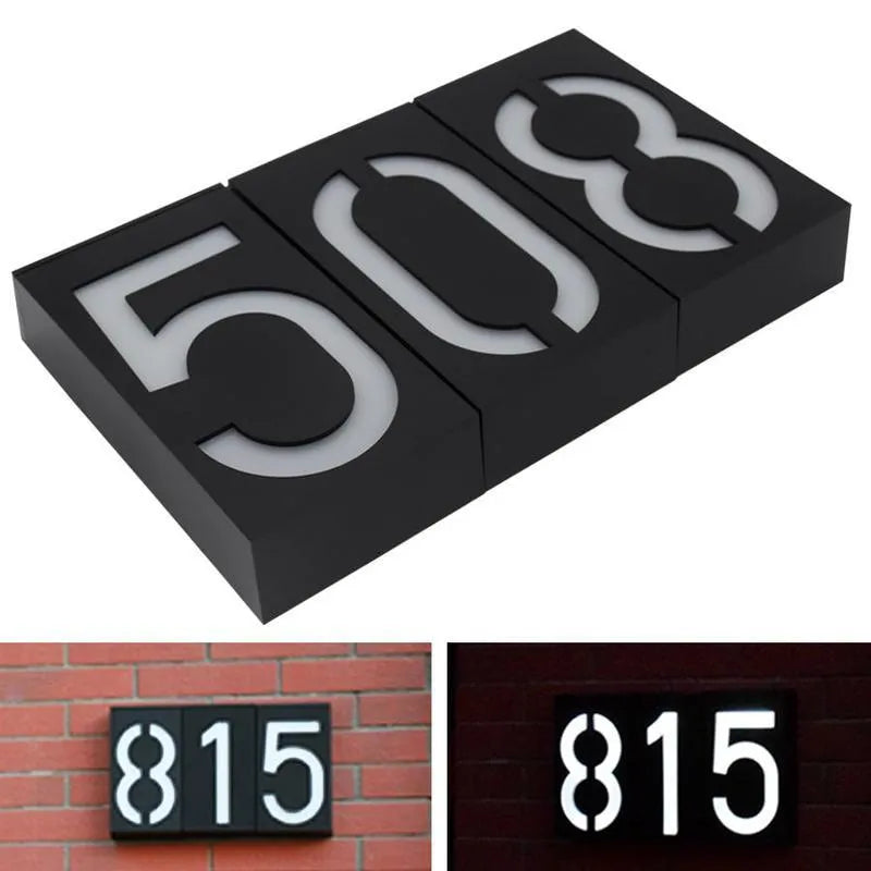 Solar powered house number light with white LEDs illuminating digit, IP65 waterproof outdoor design