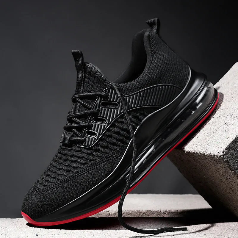 Men's black low-top mesh running shoes with white rubber sole and lace-up front.