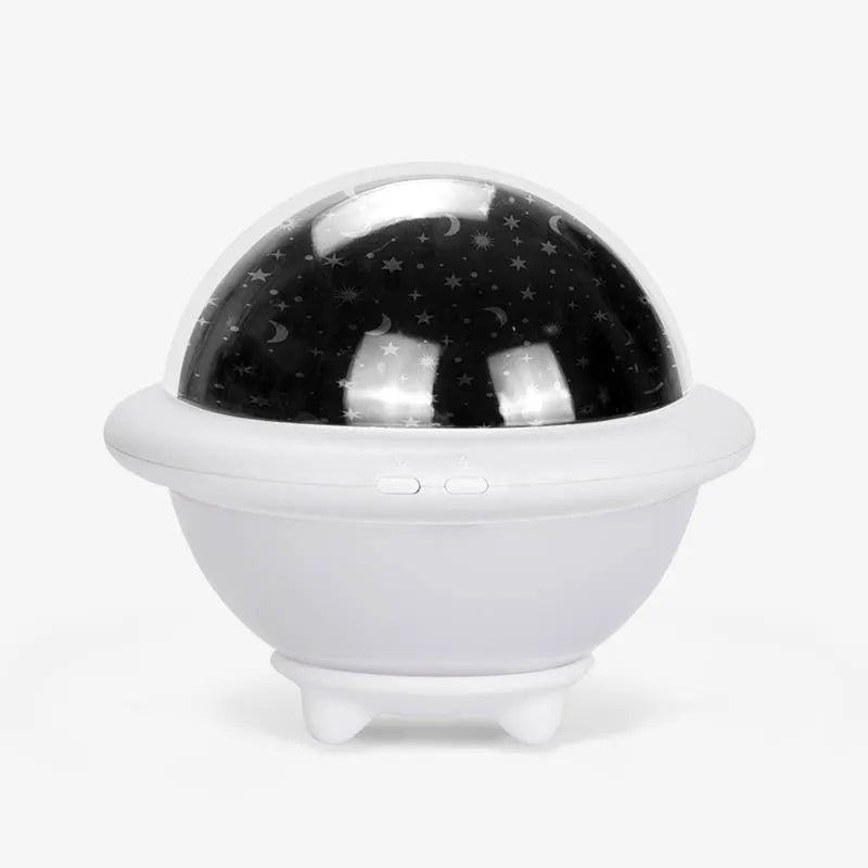 UFO-shaped plastic starry sky projection light in green colour showing rotating LED display