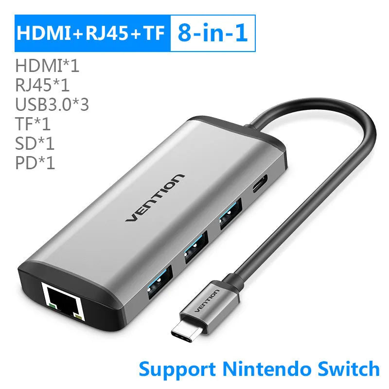 Deep grey USB-C to HDMI, USB 3.0, Ethernet, and card reader multi-port adapter hub