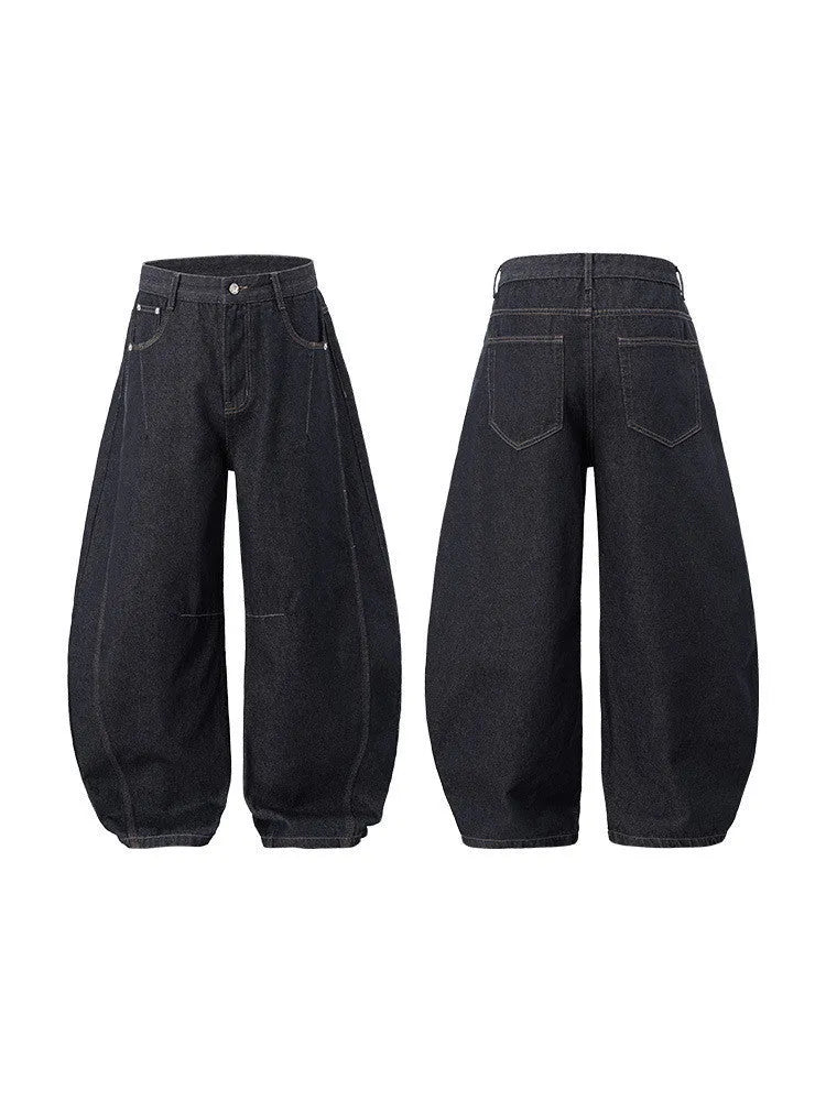 Men's wide leg denim trousers in original cow colour, showing relaxed fit and mid waist design