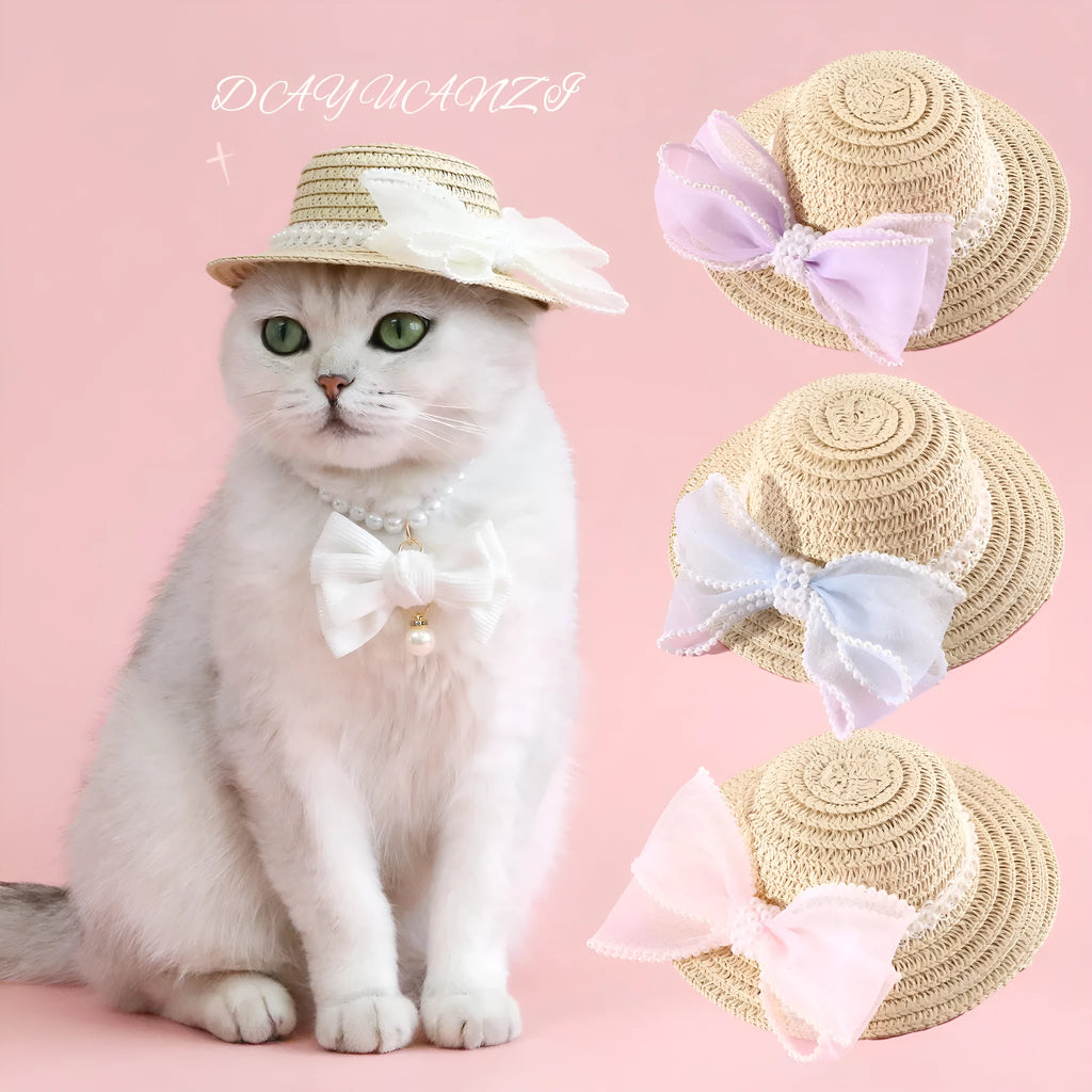 Pet cat wearing princess-style straw hat with woven pearl bow decoration in lafite leaves material