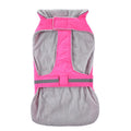 Reflective winter dog coat in pink, with harness holes, lay flat