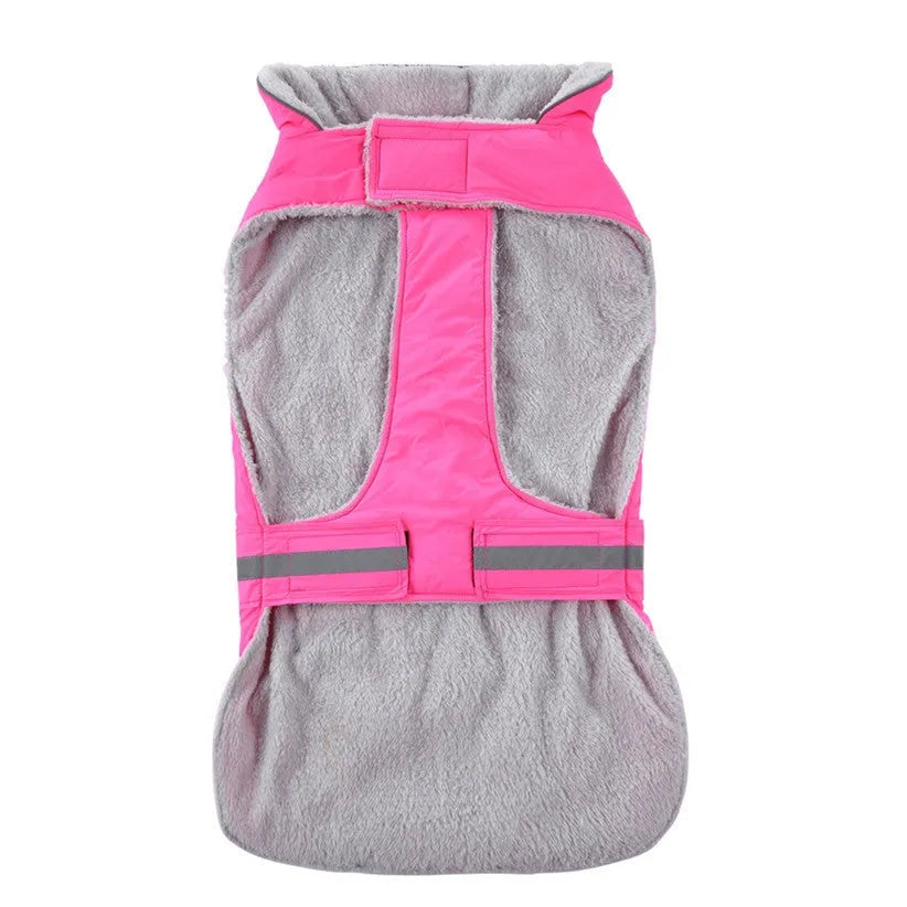 Reflective winter dog coat in pink, with harness holes, lay flat