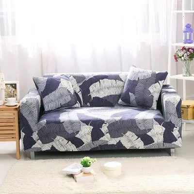 Geometric patterned stretch sofa slipcover fitted on a modern two-seater sofa.