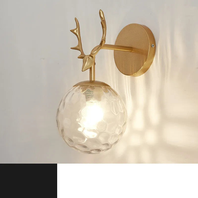 Minimalist round Nordic style glass wall lamp on a white wall