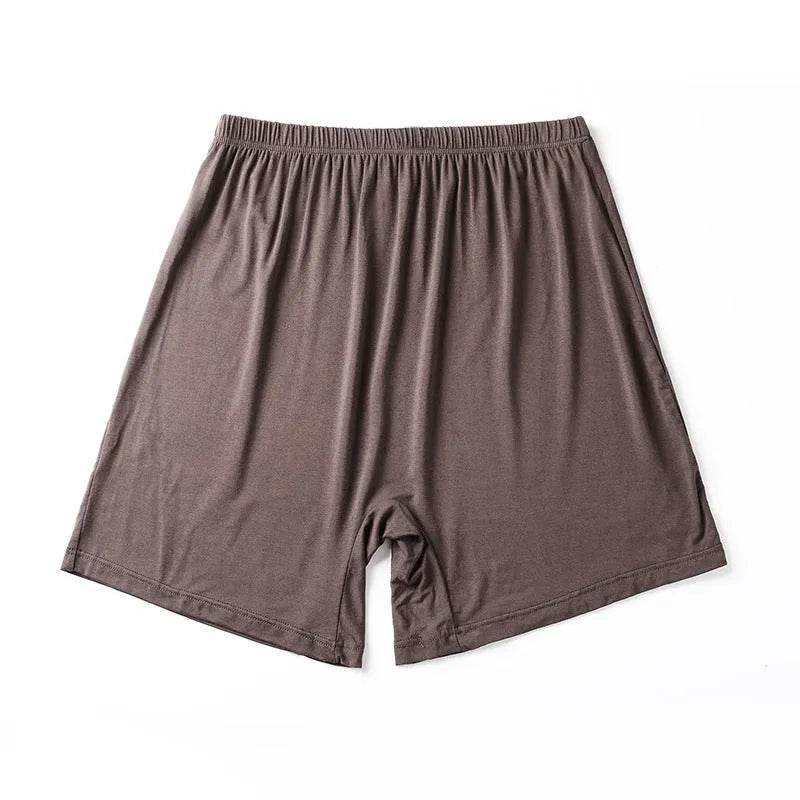 Men's solid colour modal boxer shorts with high waist in black, displayed flat.