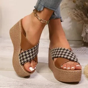 Cross leopard plaid pattern wedge sandals with a brown and black design and a rubber sole.