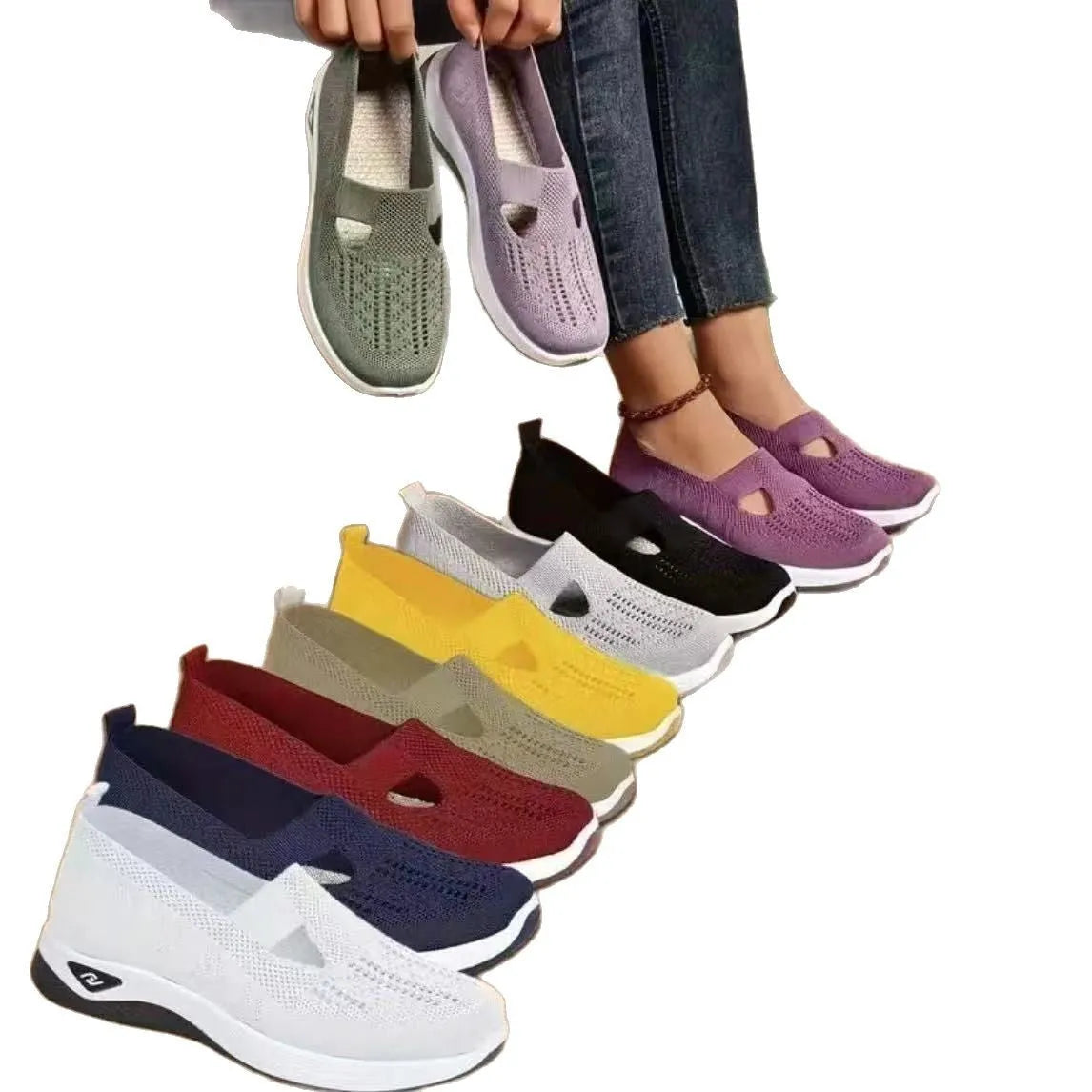 Women's black casual mesh shoes with T-strap and flat soft sole.