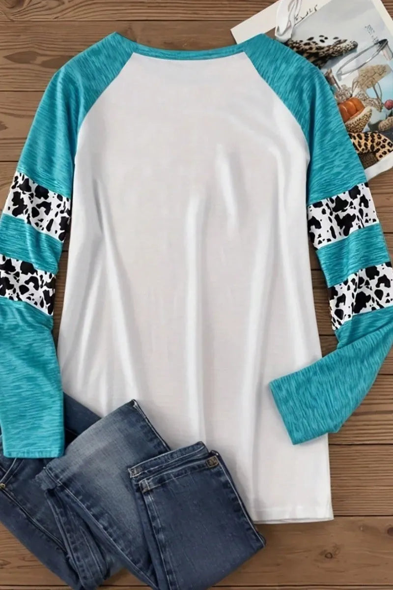 Sky blue long sleeve t-shirt with a detailed 3D printed Halloween pumpkin design on the front.