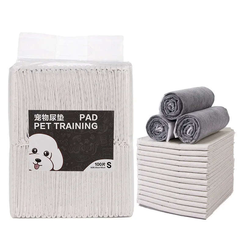 Pack of white pet urinal pads with blue trim, shown alongside a tape measure indicating the 45x60cm M size dimensions.