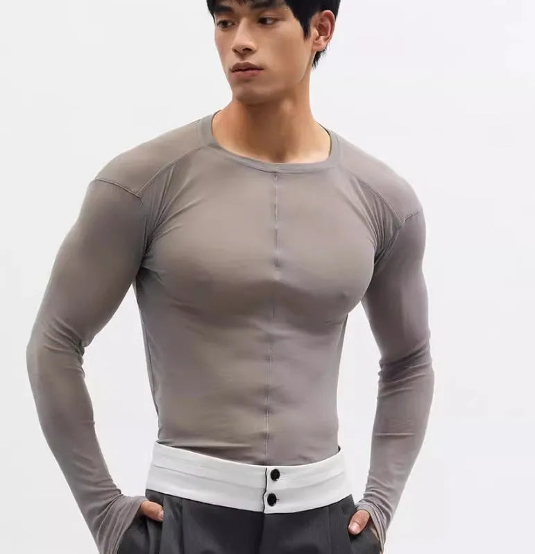 Black slim-fit women's pullover top with see-through mesh texture and long sleeves.