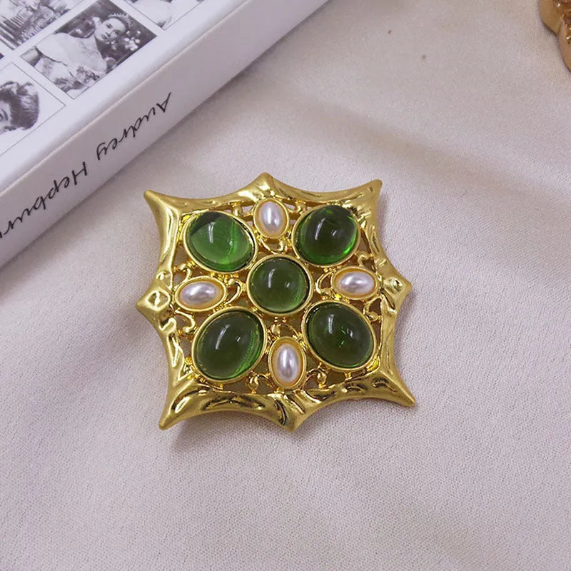 A vintage-style medieval baroque crystal brooch made from zinc alloy, shown in one of eight available colour options.