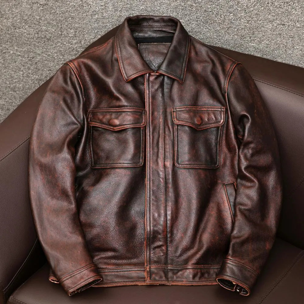 Man wearing a black loose-fit lapel PU leather jacket with side pockets.