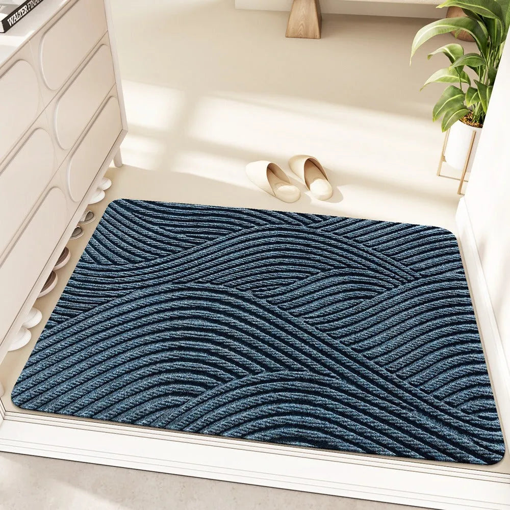 Diatom oil entrance mat with alien shape design in blue colour, measuring 60 by 90 centimetres