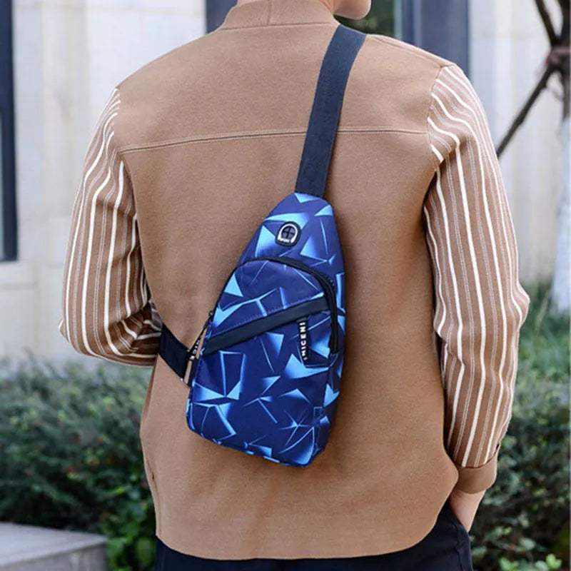 Men's print sling chest bag with earphone hole, Oxford cloth construction, showing front view with zipper opening