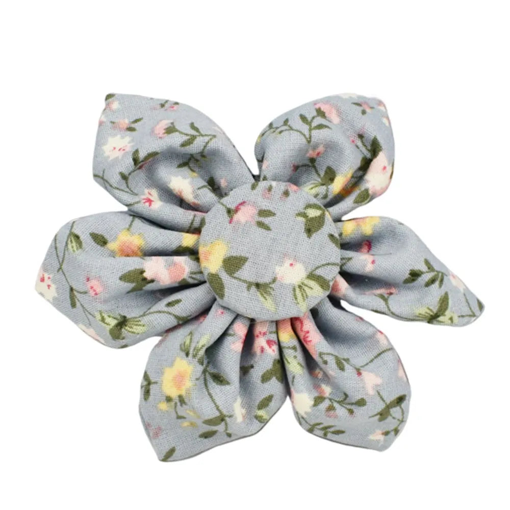 Blue floral pattern dog collar set with matching leash, bow, vest and waste bag dispenser accessories