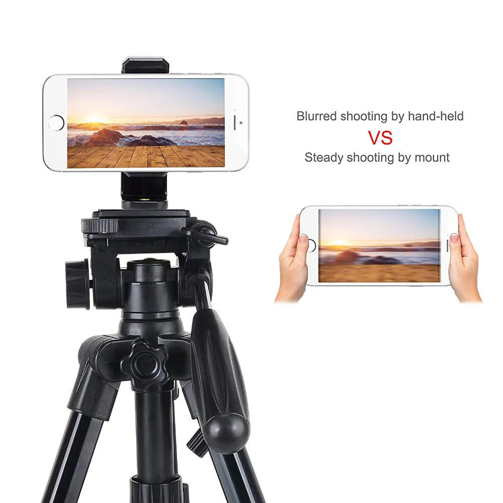 Black plastic phone holder with rotating clamp on a desk