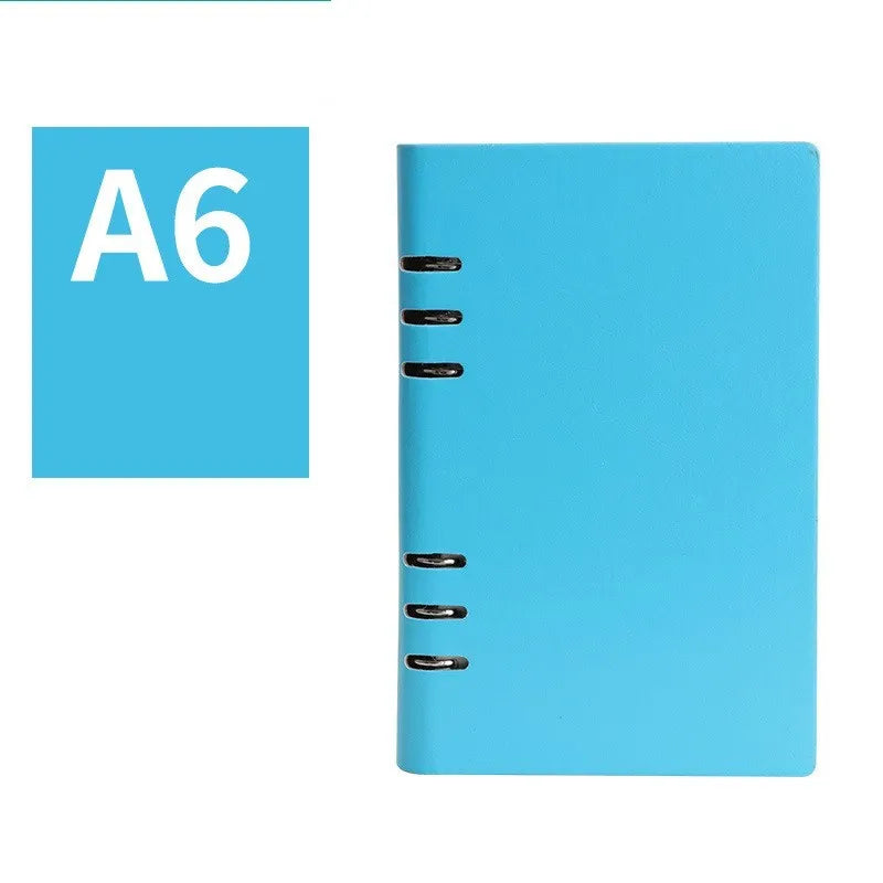 Loose-leaf business notebook with imitation leather cover in multiple colours, open to show beige paper.