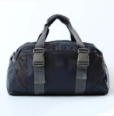 Nylon gym and yoga bag shown in black, available in medium and large sizes.