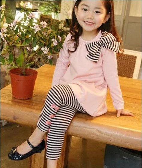 Pink cotton girls' two-piece clothing set showing front view with size options 110cm to 140cm