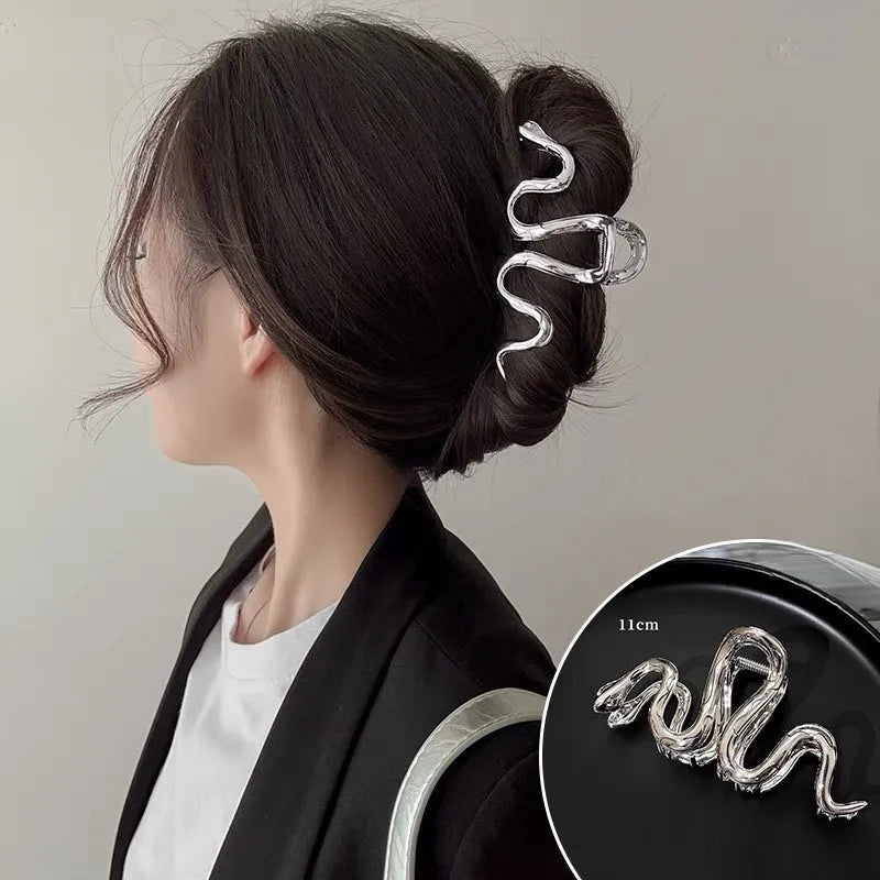 Metal Slytherin serpentine snake hair barrette in silver or gun black, 10.5 cm long.