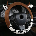 Short plush steering wheel cover showing protective handle section and 38cm diameter measurement
