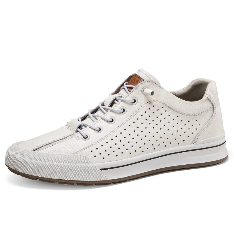 Men's white leather casual shoes with flat heel and round toe on a plain background