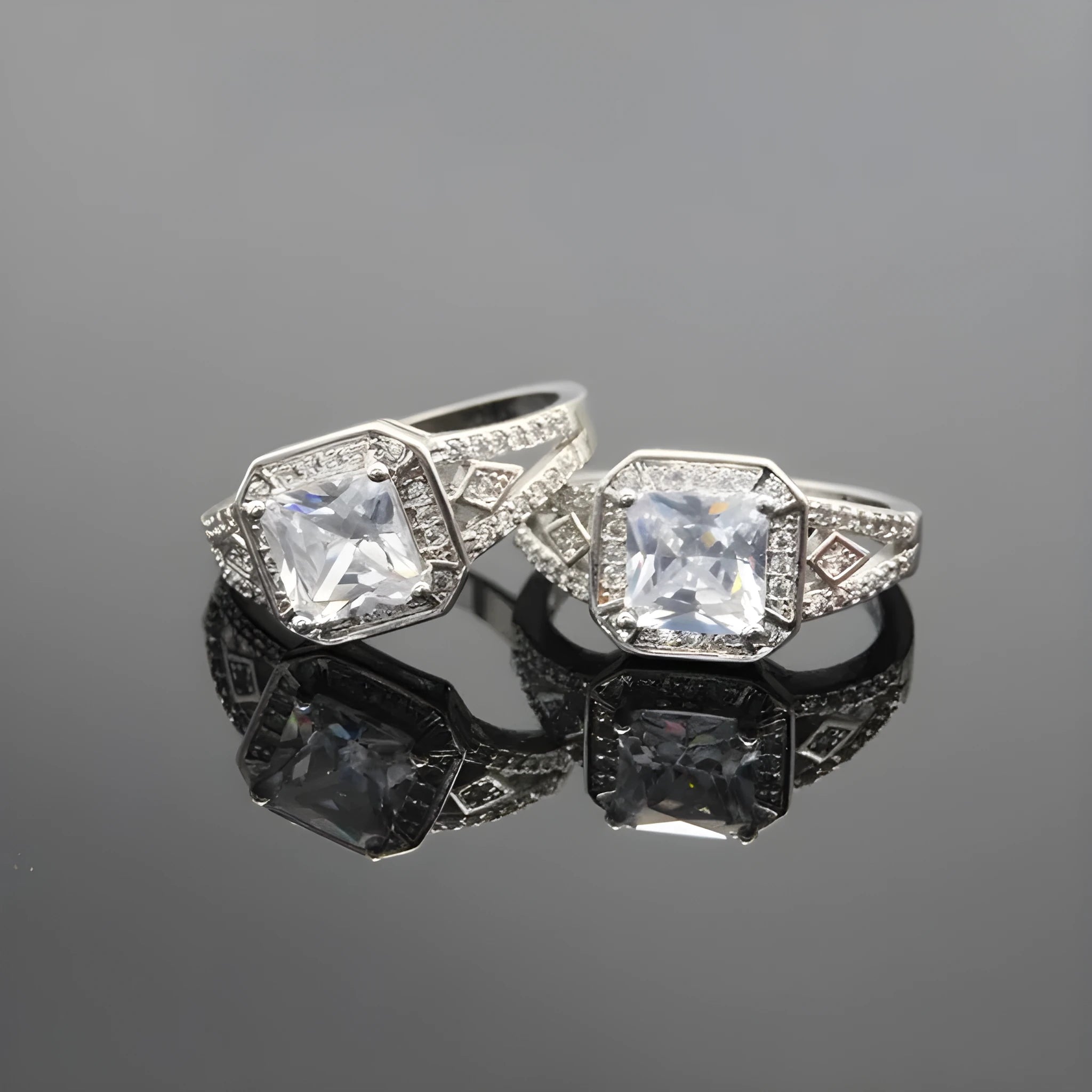 Platinum finish geometric zircon ring with hollow design and quadrilateral patterning