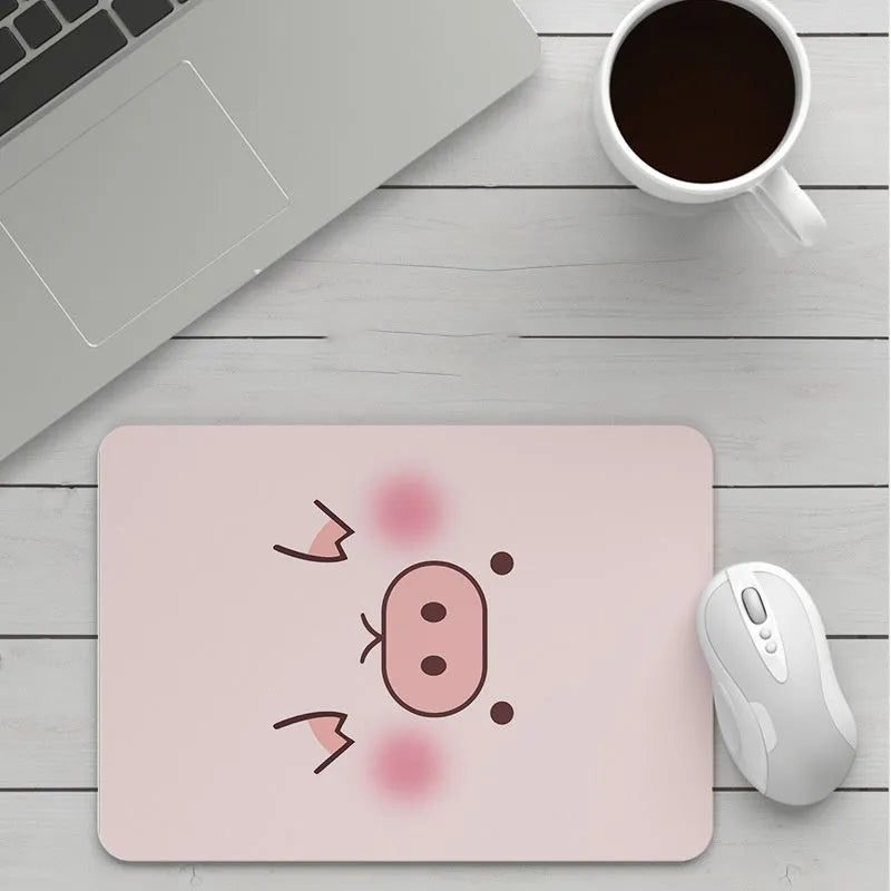 Custom cartoon mouse pad with thickening, showing example artwork on non-slip rubber and cloth base.