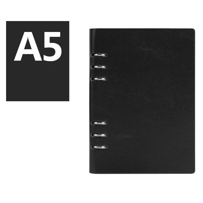 Loose-leaf business notebook with imitation leather cover in multiple colours, open to show beige paper.