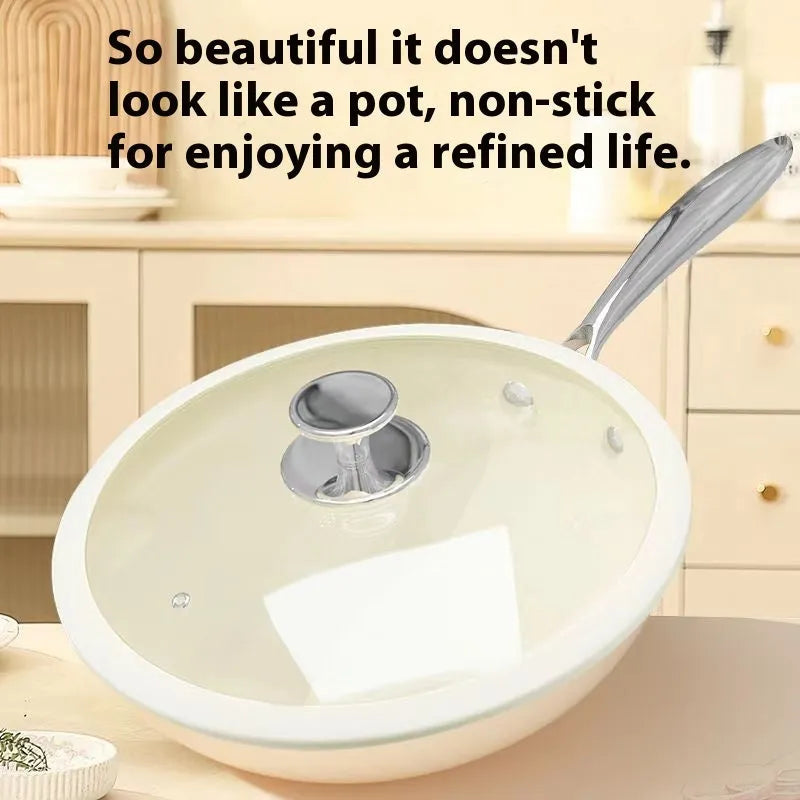 28cm pebble ceramic non-stick stir fry pan with refined iron body and stainless steel glass lid on a kitchen counter