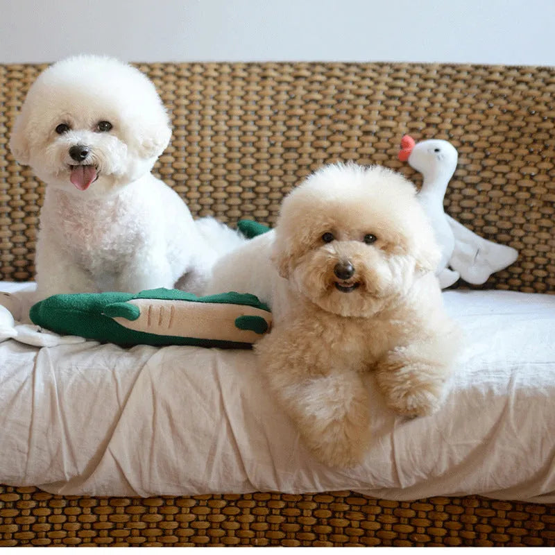 Green interactive plush dog toy with squeaker and crinkle sounds, measuring 35 cm long.