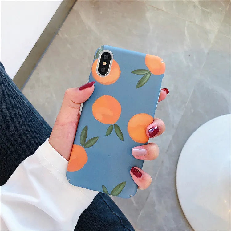 Orange retro plastic iPhone case with water and blue background design shown on smartphone