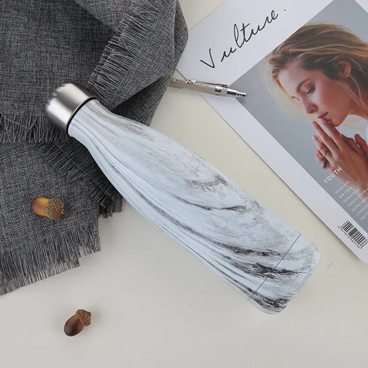 500ml stainless steel vacuum flask with silver finish, double wall insulation, screw cap, suitable for hot and cold drinks