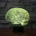 3D acrylic brain illusion LED lamp with colour changing modes and remote control on desk
